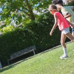 Belgrade Outdoor Activities - Kids Walking on the Grass Field