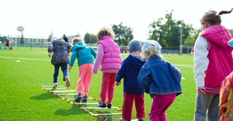 Kids Activities - Children's Team Building on Green Grassland