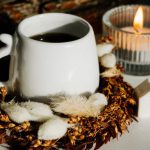 Coffee Tea Houses - Cup of Tea in Autumn Wreath beside Burning Candle