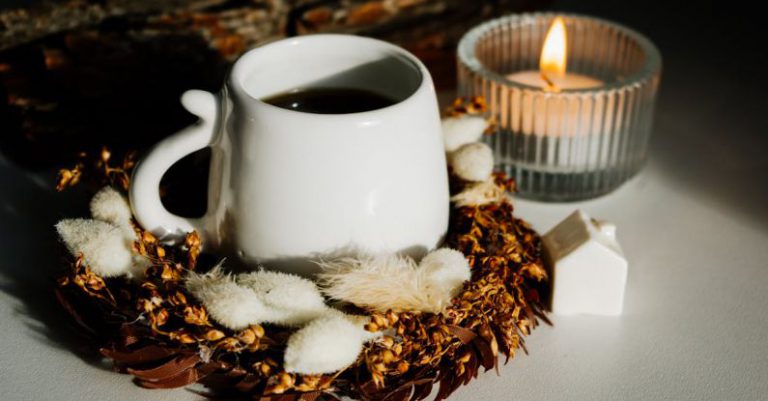 Coffee Tea Houses - Cup of Tea in Autumn Wreath beside Burning Candle