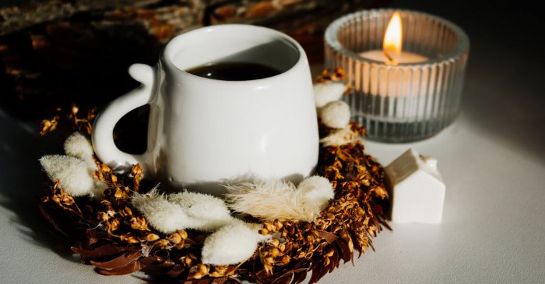 Coffee Tea Houses - Cup of Tea in Autumn Wreath beside Burning Candle