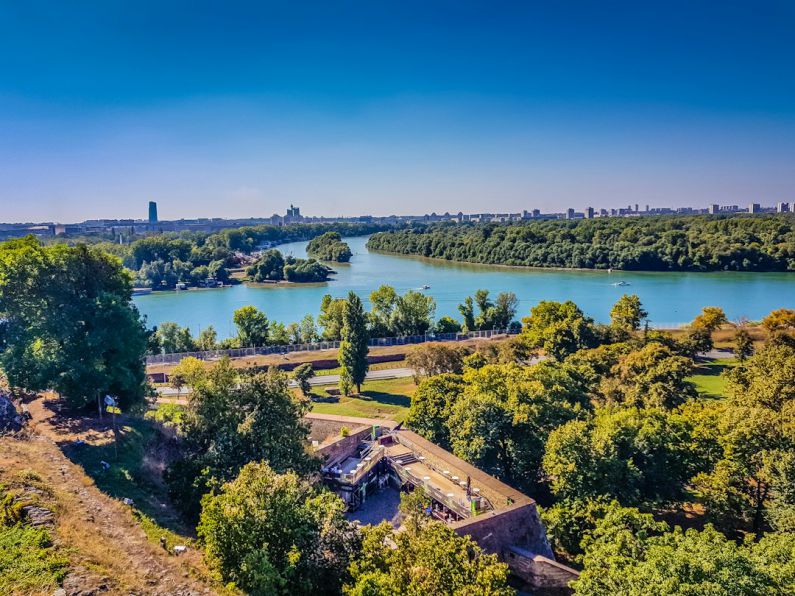 Kalemegdan Belgrade - an aerial view of a river running through a park