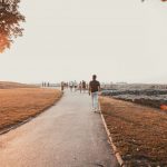 Belgrade Culture - couple walking on gray concrete road during daytime