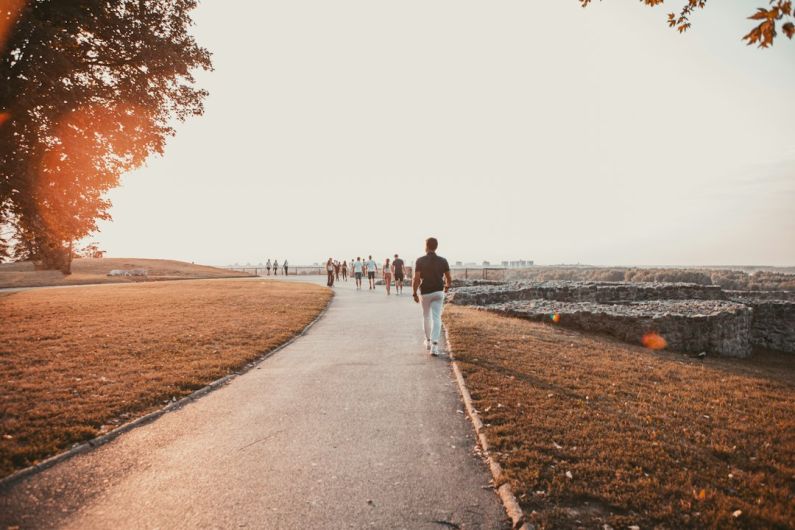 Belgrade Culture - couple walking on gray concrete road during daytime