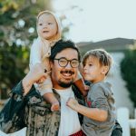 Belgrade Family Activities - man in white shirt carrying girl in gray shirt