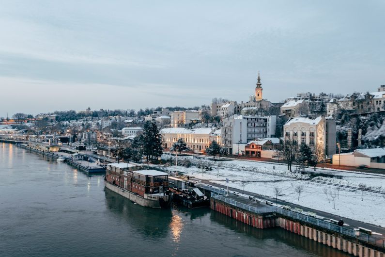 Belgrade Landmarks - city buildings near body of water during daytime