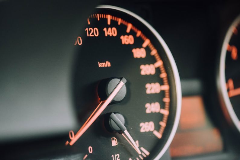Belgrade Car Rental - closeup photo of black analog speedometer