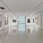 Tesla Museum Belgrade - assorted paintings on white painted wall