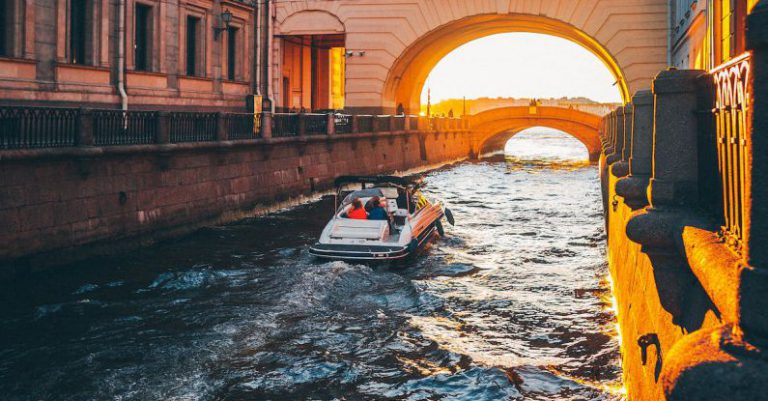 City Tour - A Motor Boat in a River Canal