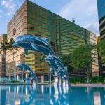 Luxury Hotels Belgrade - Three Blue Dolphins Statue Front of Water Near Building