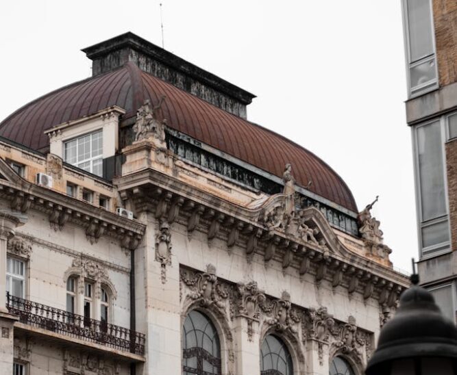 A classic architectural facade of a historic building in Belgrade, Serbia captured in a vertical shot.