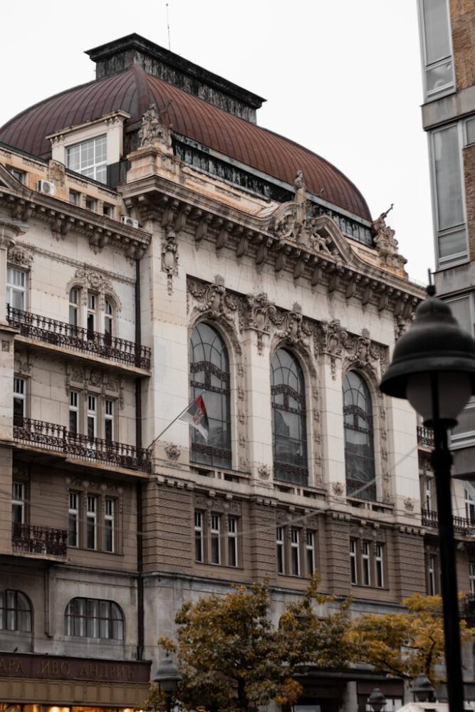 A classic architectural facade of a historic building in Belgrade, Serbia captured in a vertical shot.