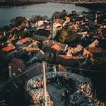 Captivating aerial view of Belgrade's historic harbor and town, showcasing architectural charm and the scenic Danube River.